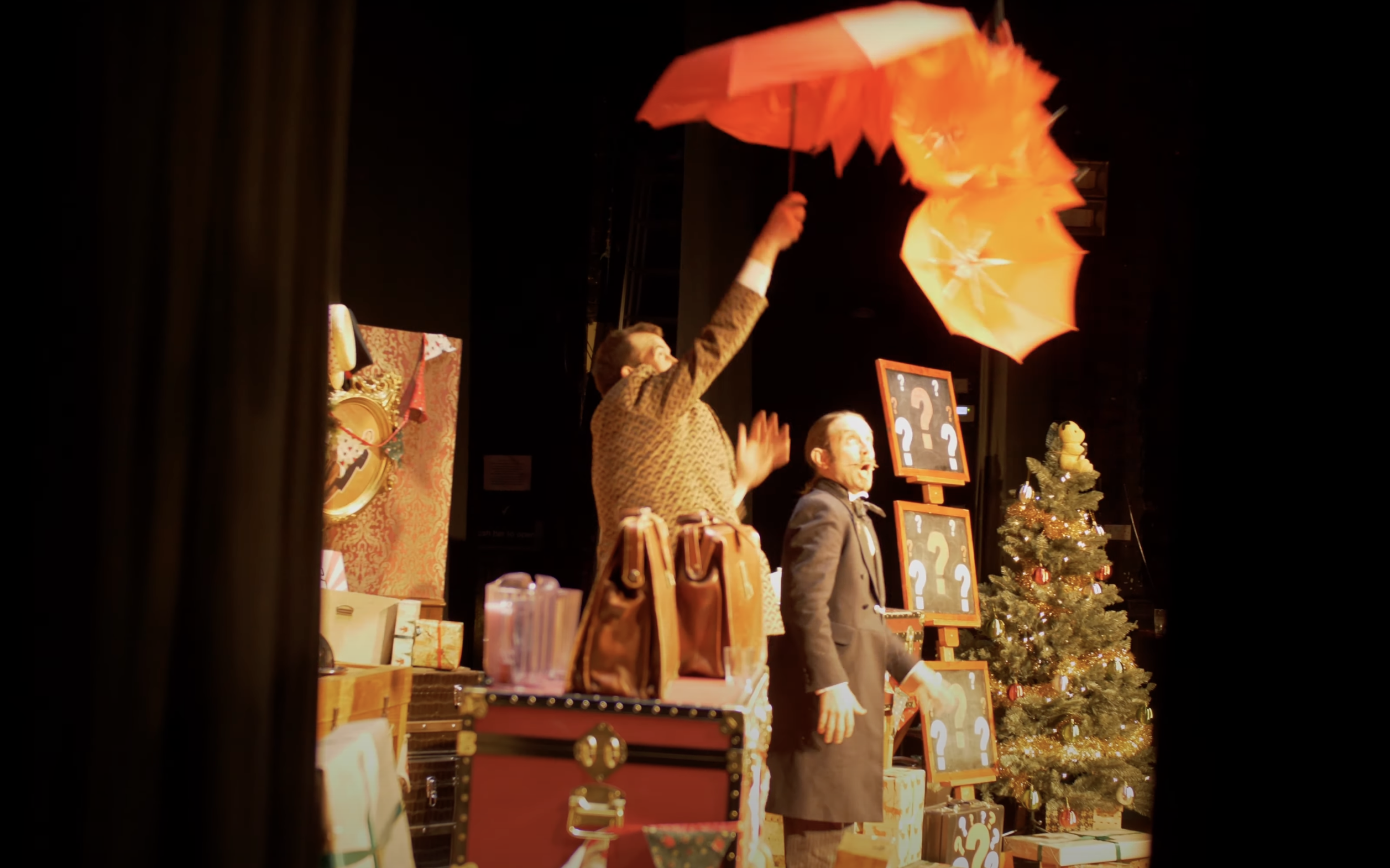 magiciansperforming a trick on stage